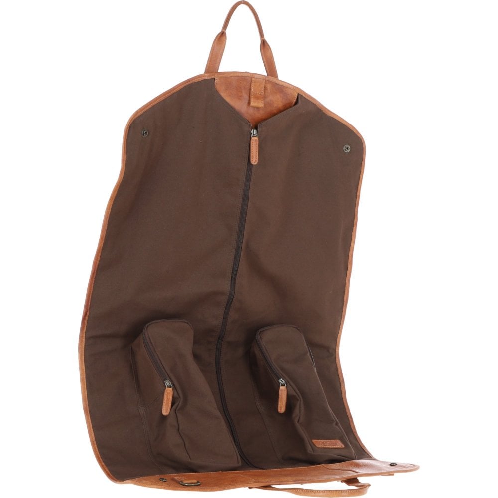 "Tan leather suit carrier bag by Ashwood, Savile model, designed for travel and garment protection. Made from hand-waxed genuine leather, this foldable bag includes designated compartments for shoes and accessories, plus a detachable shoulder strap for versatility. Perfect for business travel, it combines elegance and functionality, ensuring wrinkle-free transport of suits and formal wear."