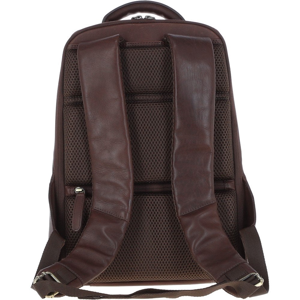 Premium men's backpack crafted from brown, genuine leather by Ashwood, model K-47. The backpack features a sleek, structured design with a natural hand-waxed finish, enhancing its rich, earthy tones. Includes adjustable straps, a front zipper pocket, and a main compartment designed to fit a laptop or tablet, ideal for commuting, work, or travel. This durable and stylish bag reflects Ashwood's commitment to quality and ethical craftsmanship, making it a versatile accessory for professional or casual use.