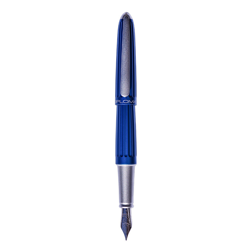 "Luxury Diplomat Aero Blue fountain pen, inspired by aeronautical design, featuring a sleek anodized aluminum body with grooved lines and a glossy metallic finish. Available in multiple colors, the pen has a streamlined, Zeppelin-inspired shape, a slender clip with Diplomat’s logo, and a comfortable grip with smooth operation. Known for its elegance and durability, this high-end writing instrument is suitable for collectors and professionals seeking style and performance."