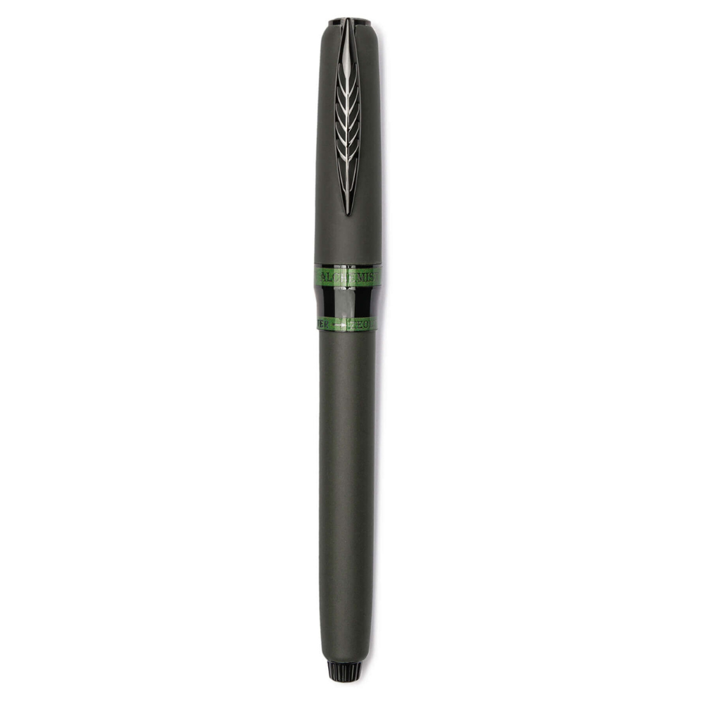 "Pineider Alchemist fountain pen in Krakatoa Green, crafted from a unique blend of zeolite and resin with a black-green finish and black trim. Features Pineider’s soft-touch magnetic lock cap, a black-plated stainless steel nib (size No.6), and includes an ink converter compatible with standard cartridges. Presented in a gift box, this luxury pen combines elegant design with volcanic-inspired materials, perfect for collectors and writing enthusiasts."